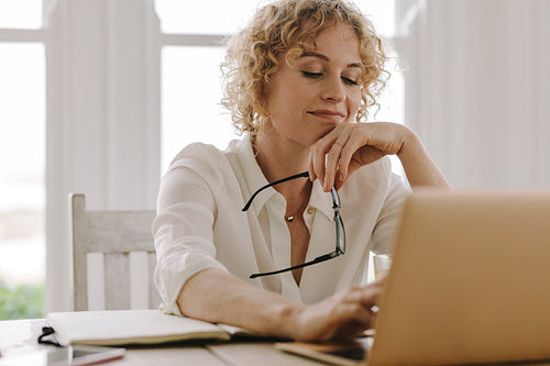 Woman doing office work from home