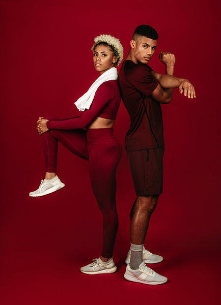 Portrait of fitness couple doing warm up exercises
