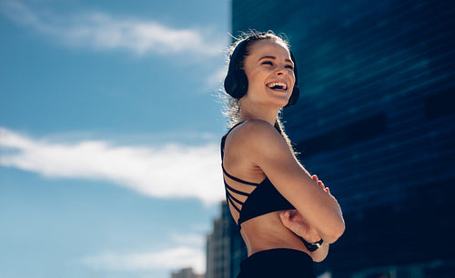 Sporty woman taking rest after training session
