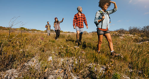 Young friends hiking in countryside