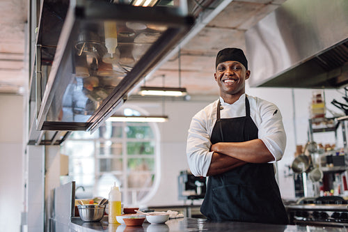Chef standing at restaurant kitchen