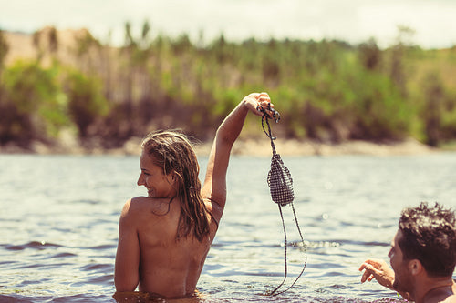 Couple having fun in a lake