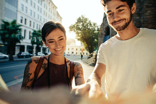 Tourist couple exploring the city