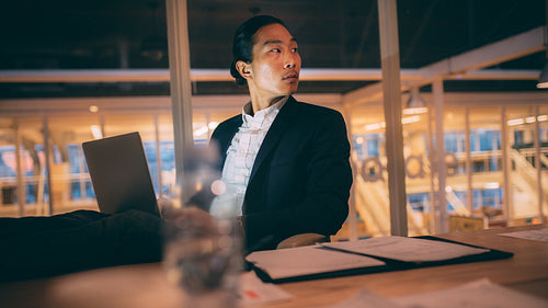 Businessman working late night in office