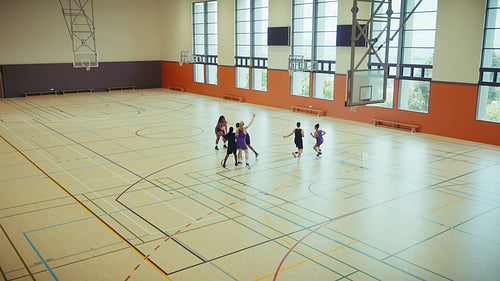 Young people enjoying a basketball game