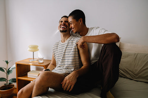 Happy couple enjoying quality time together in a modern and cozy room