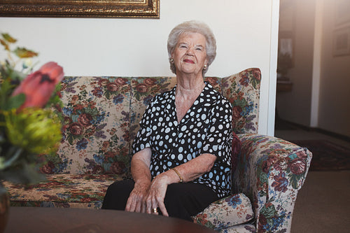 Senior woman relaxing at old age home