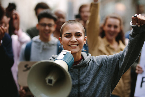 Woman protesting with a megaphone