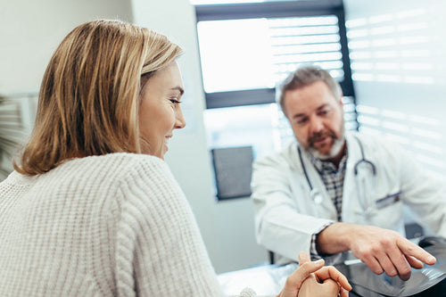 Patient talking with doctor during a consultation