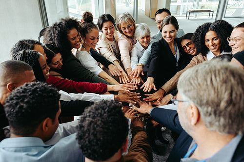 Group of diverse people with teamwork and inclusion at a conference setting