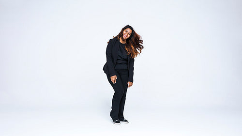 Smiling businesswoman in formal wear