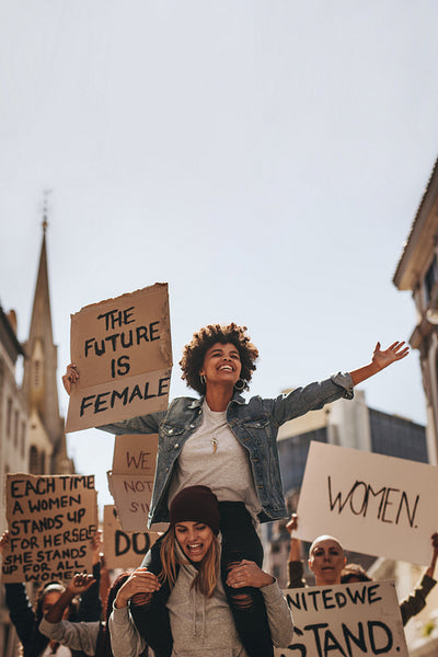 Female demonstrators enjoying the protest on road