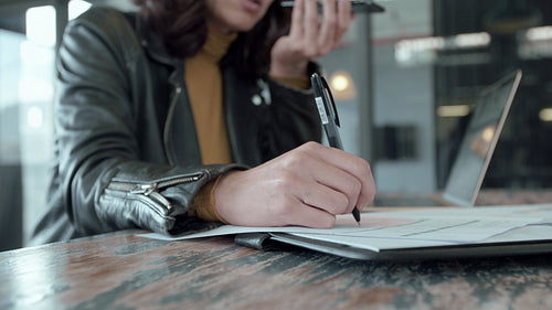 Asian business woman working on annual reports