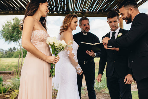 Rings exchange ritual at wedding ceremony