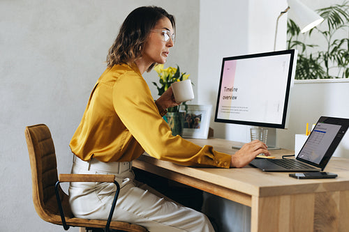 Focused businesswoman strategizing marketing campaign in office