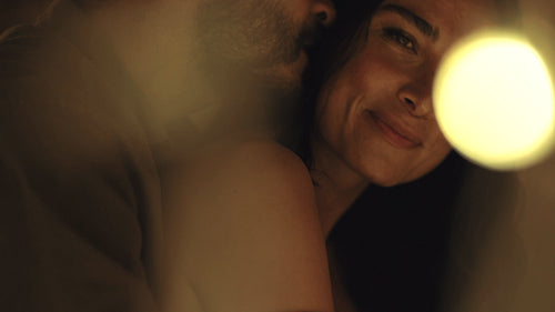 Loving young couple at party