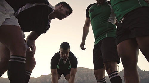 Rugby players doing a scrum