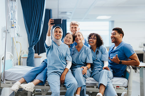 Happy medical class taking a selfie together in a hospital