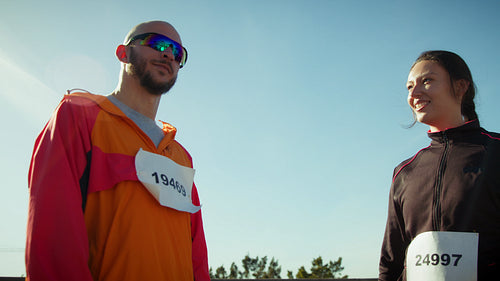 Happy runners preparing for a marathon