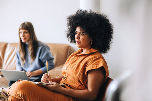 Ethnic businesswoman sitting in a meeting
