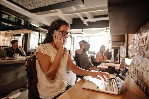 Casual businesswoman working at startup office