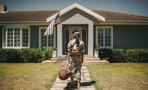 Female soldier returning home from the army