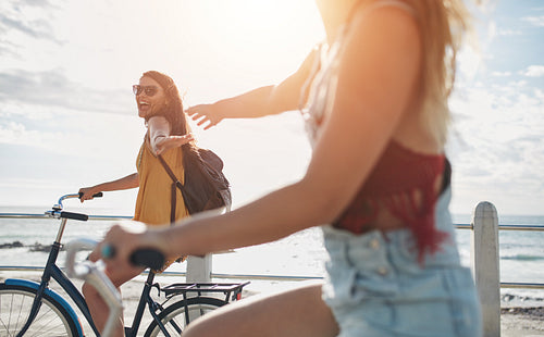 Two friends out for a bike ride on sunny day