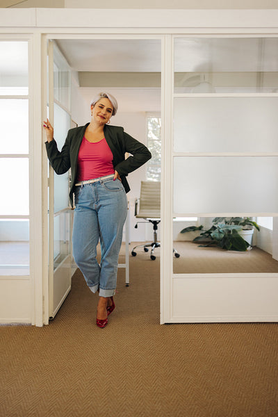 Confident businesswoman standing in a modern office