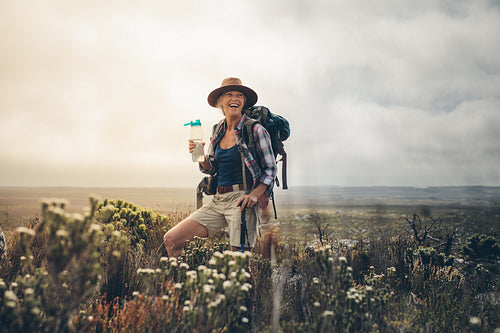 Female hiker relaxing during a trek