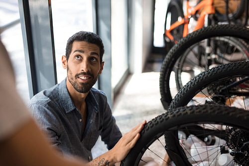 Man in a bicycle workshop