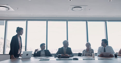Group of happy coworkers meeting in conference room