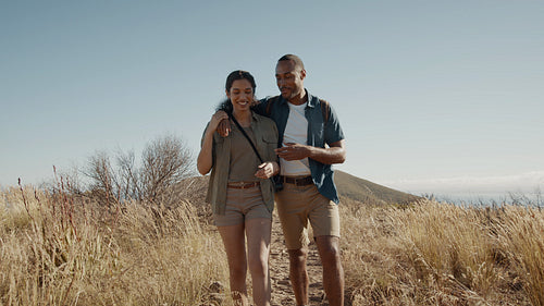 Couple in love on a mountain hike