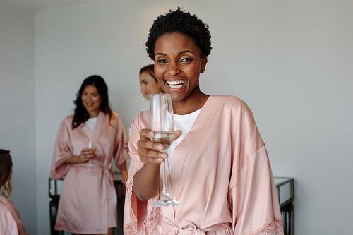 Cheerful woman at bachelorette party of a friend