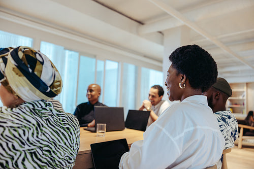 Diverse team working together during a collaborative company meeting
