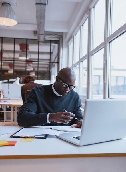 Executive working in office.