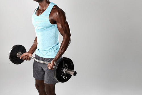 Fitness man lifting weights