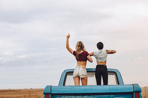Women enjoying themselves on road trip