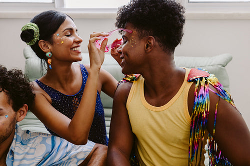 Friends celebrate carnival makeup and color