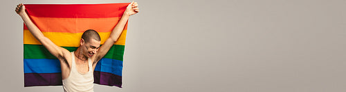 Banner of a transgender man with pride flag