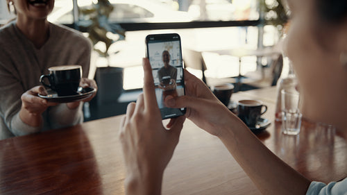 Female friends having fun at a coffee shop
