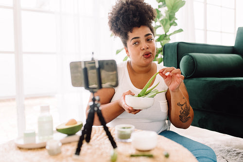 Female beauty influencer making a vlog