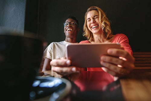 Friends having fun at a coffee shop