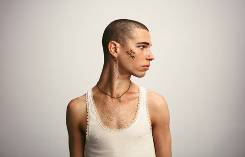 Transgender male in a tank top