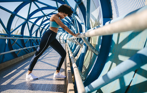 Runner doing stretching exercises