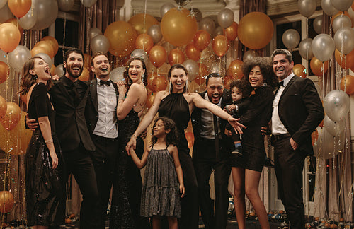 Portrait of socialites at a new years party