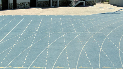 Sprinter practicing on athletic race track