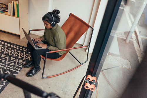 Female computer programmer working at her startup