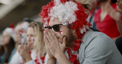 English soccer fans celebrating a goal