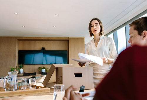 Business professionals having a meeting in boardroom