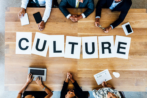 Business meeting with word Culture on table